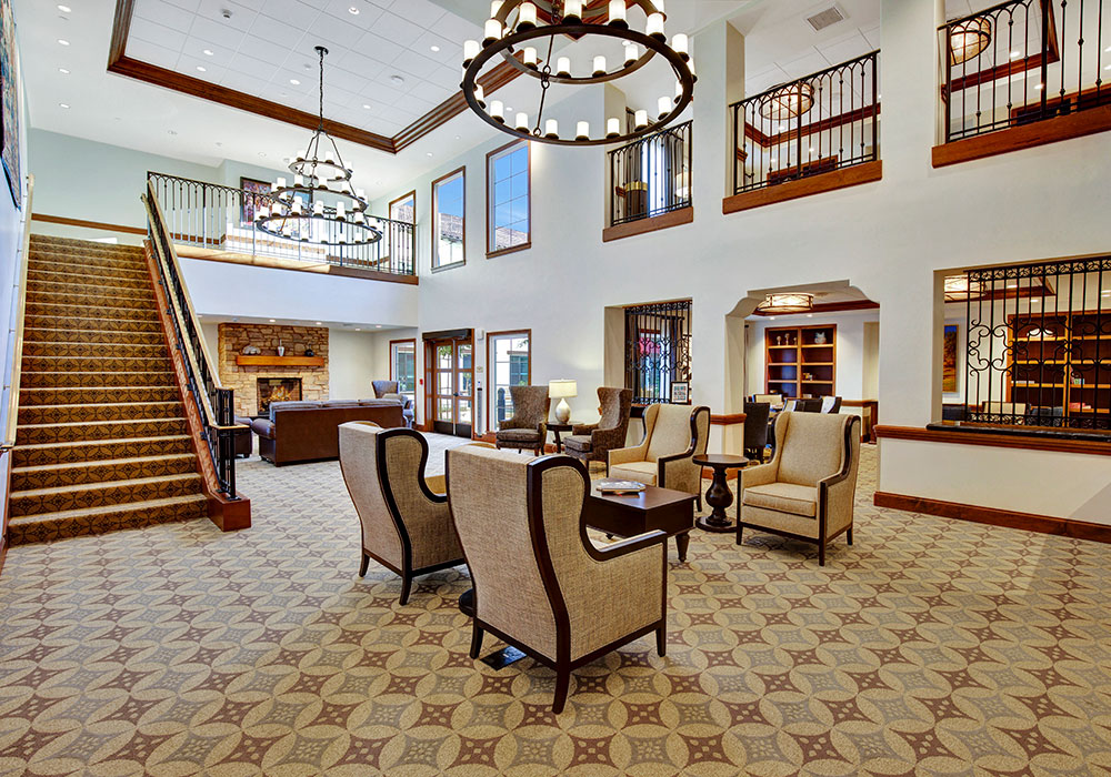 ridgeview-1000x700-4 Lobby with grand staircase and chandeliers