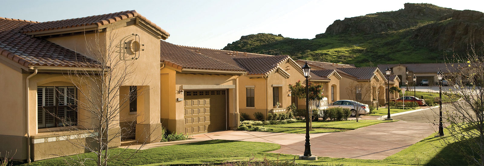 Home with garage and mountain view.