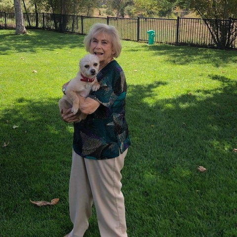 Resident Hertha Hollander and her furry friend, Brandy