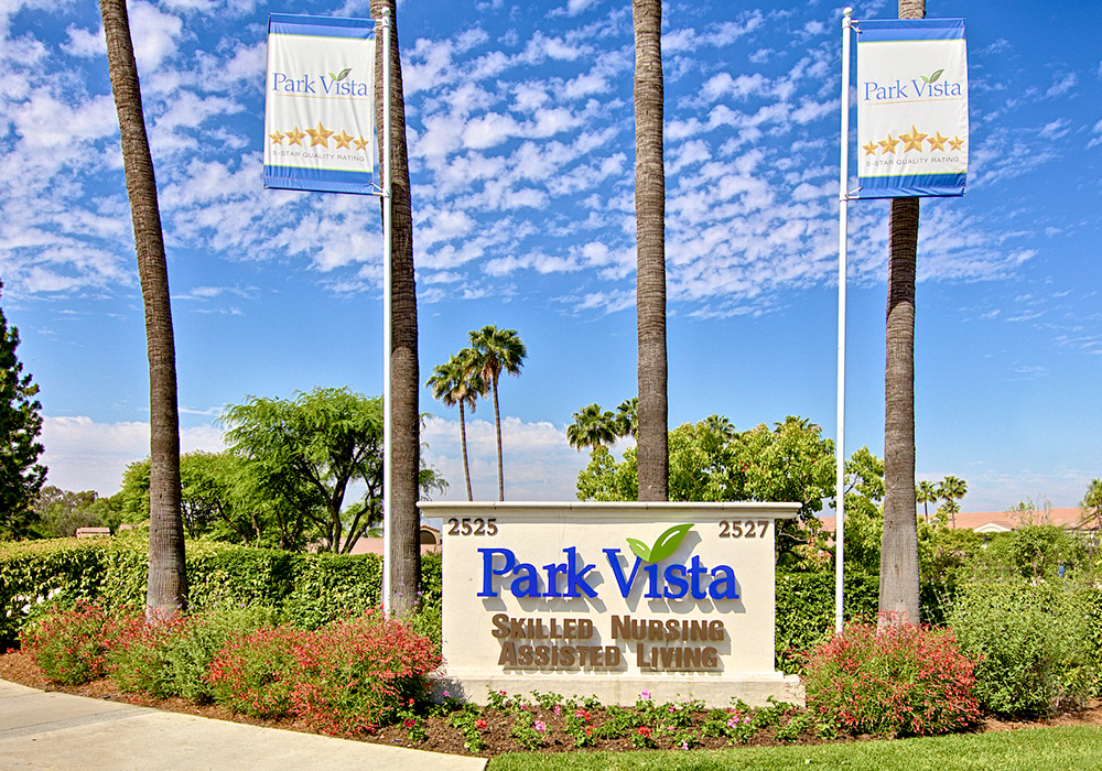 Parkvista 1000x700 13 Park Vista Skilled Nursing sign in front of palm trees