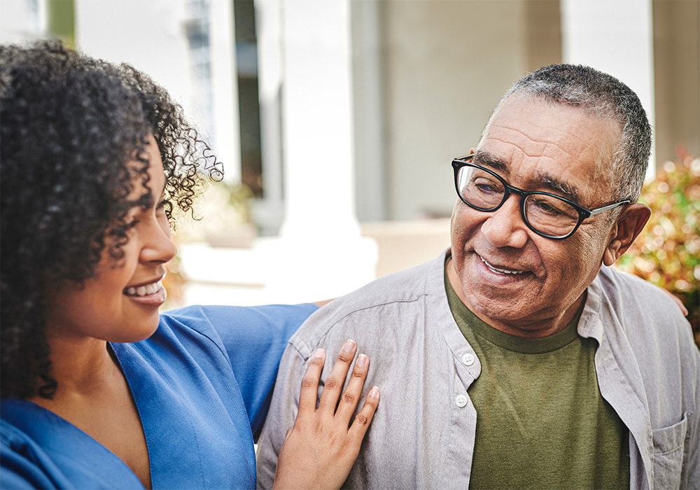 parkvista-1000x700-38 A man with a caregiver smiling